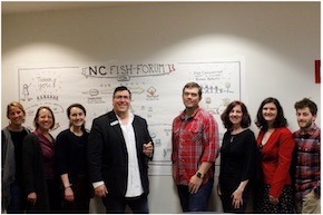 NC Fish Forum team in front of a white board.