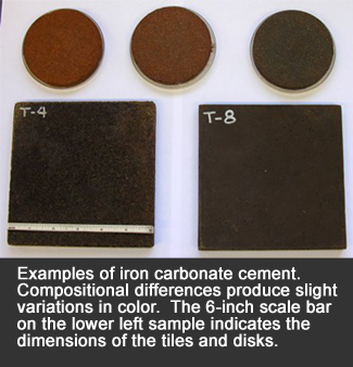 Image showing examples of iron carbonate cement, with the caption: Examples of iron carbonate cement. Compositional differences produce slight variations in color.  The 6-inch scale bar on the lower left sample indicates the dimensions of the tiles and disks.