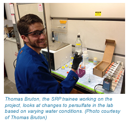 A photo of Thomas Bruton, an SRP trainee, in the lab.