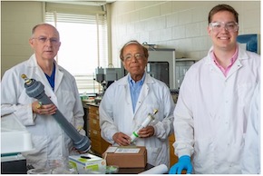 Three researchers in their lab at the University of Kentucky