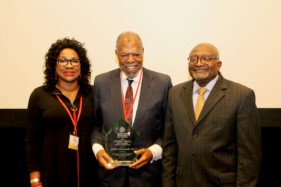 Wright (left) and Bullard (right) pose with former NIEHS Director Kenneth Olden, Ph.D. (center), who received the Damu Smith Power of One Award during the November 2019 Historically Black Colleges and Universities Climate Change Conference. (Photo courtesy of the Deep South Center for Environmental Justice).