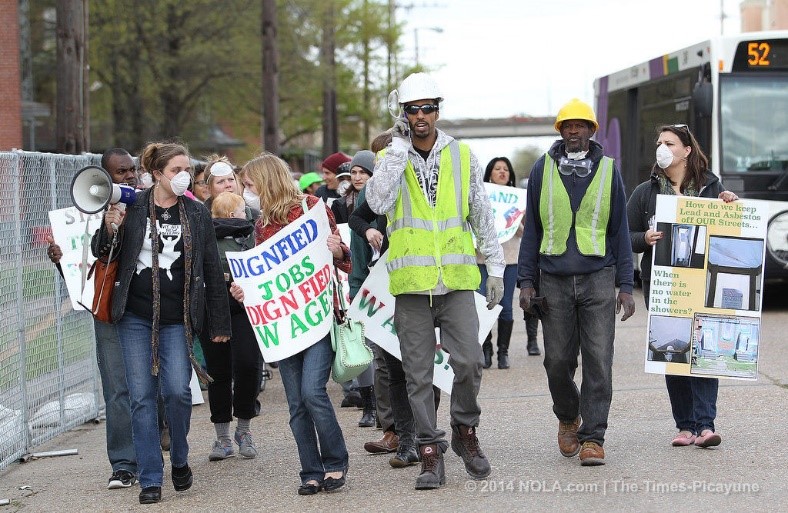 Demolition workers and supporters marched to protest working conditions on the demolition site at the Iberville Housing Development on March 17, 2014. (Photo courtesy of Dinah Rogers, NOLA.com / The Times-Picayune)