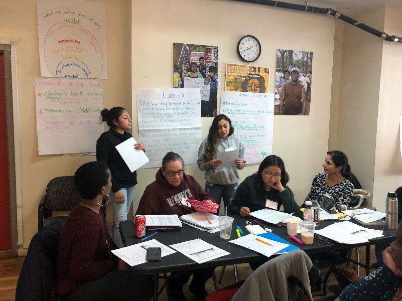 Students present their analysis of case studies during a core competencies workshop on the social determinants of health. (Photo courtesy of Maiber Solarte, MRNY)