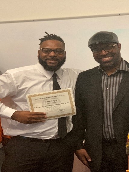 L. Pickett (left) poses with his graduation certificate after completing the Los Angeles Black Worker Center Ready to Work Boot Camp. (Photo courtesy of WRUC)